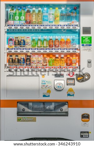 TOKYO, JAPAN - NOVEMBER 30, 2015: Vending machine (Jido-Hanbaiki) sell soft drink bottle hot, cold beverage,  green, black tea, coffee, soda, cola, water, energy drink, orange juice automatic in Japan
