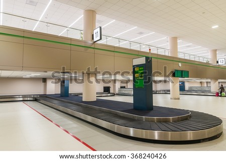 BANGKOK, THAILAND - JANUARY 26, 2016: Empty Carousel at Baggage Claim Hall at Don Mueang International Airport DMK New Terminal 2 re-opened on 24 December 2015 for domestic flights.