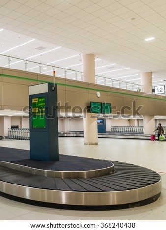 BANGKOK, THAILAND - JANUARY 26, 2016: Empty Carousel at Baggage Claim Hall at Don Mueang International Airport DMK New Terminal 2 re-opened on 24 December 2015 for domestic flights.