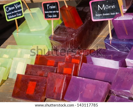 Natural colorful fruit soap bars at market.