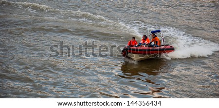 PARIS - MAY 25:  Unidentified volunteers of Civil Protection during evening patrol on water as seen on May 25, 2013 in Paris, France. French Protection Civile consists of 32 000 volunteers.