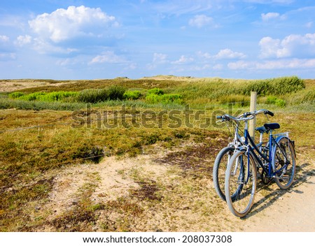 Two bicycles in countryside. Brittany, France. The concept of romance, love and simple everyday life.