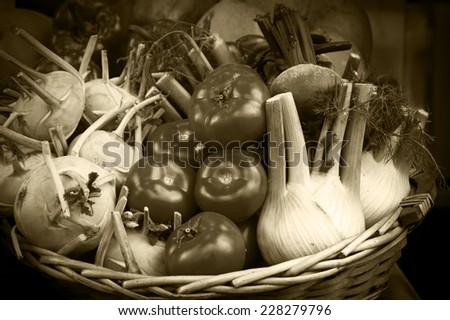Fresh produce in wicker basket from local farmer\'s market. Mediterranean diet. Aged photo. Sepia.