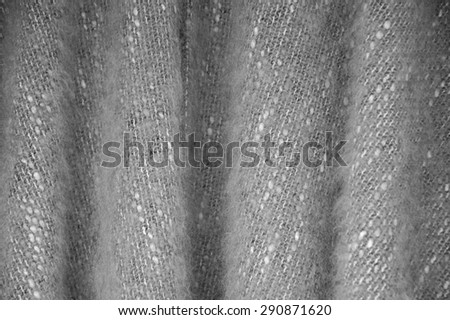 Fluffy wool material background.  Vintage woven texture. Black and white.