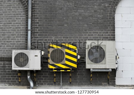 Air Condition with yellow stripes
