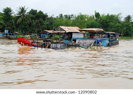 sinking-like house boat running on Mekong  Delta, Vietnam