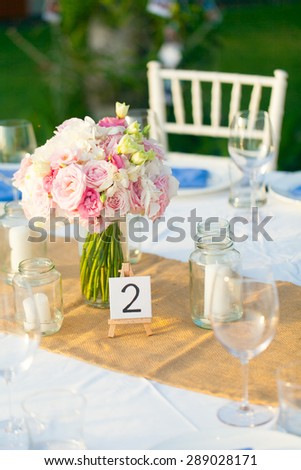 Sweetheart table detail of the wedding decoration set up outside