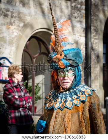 SCHWAEBISCH-HALL, GERMANY - February 23, 2014 - Senior man, dressed up in a Venetian style costume attends the Hallia Venetia Carnival festival on February 23, 2014 in SchwÃ?Â¤bisch-Hall.