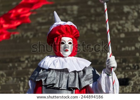 SCHWAEBISCH-HALL, GERMANY - February 23, 2014 - Man, dressed up in a Venetian style Guard costume attends the Hallia Venetia Carnival festival on February 23, 2014 in SchwÃ?Â¤bisch-Hall.