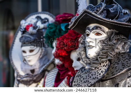 SCHWAEBISCH-HALL, GERMANY - February 23, 2014 - Group of people, dressed up in Venetian style costumes attend the Hallia Venetia Carnival festival on February 23, 2014 in Schwabisch-Hall.