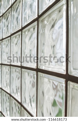 Glass block walls and white reflection.