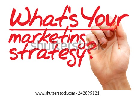 Hand writing What's Your Marketing Strategy with red marker, business concept