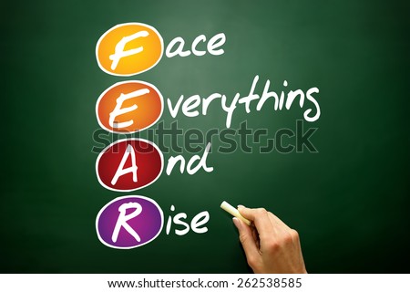 Face Everything And Rise (FEAR), business concept acronym on blackboard