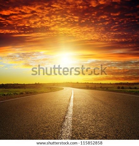 red sunset over road