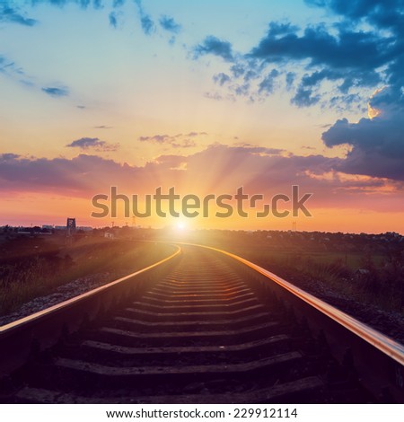 sunset over railroad to horizon