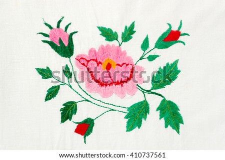 embroidered pink and red flowers
