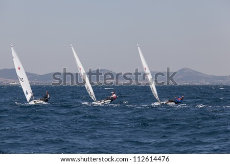 ALEXANDROUPOLI, GREECE - JULY 21: Sailing athletes at International Summer Regatta sailing action in Mediterranean sea on July 21, 2012 in Alexandroupoli, Greece