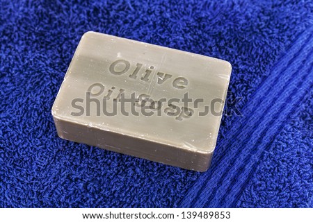 Olive oil soap on a blue towel