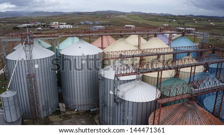 Many big colorful industrial flour mills