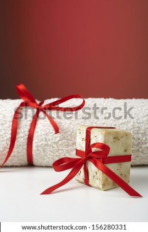 Handmade olive soap and a towel, as a gift.