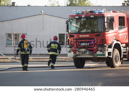 Thirteen ladders from The Poznan Fire Department were sent to battle a huge fire in a warehouse located at Jeleniogorska Street in Poznan, Poland on May 24, 2015.