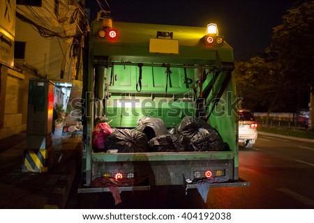 Garbage Truck On A Night Shift