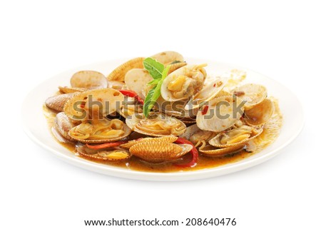 stir fried surf clams with roasted chili paste on plate isolated white background
