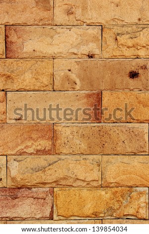 Brick Wall Texture/Brick wall with some bricks lighter colored. Texture and background Vertical