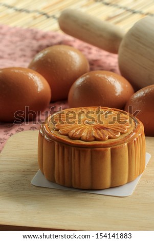 Moon cakes and egg background for the Chinese Mid-autumn festival