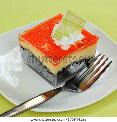 Orange Biscuit cake Layer with cheese cake in Plastic box