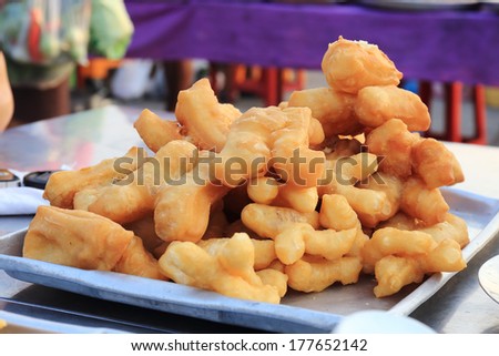 deep fried dough stick on the tray