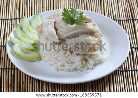 steam chicken with rice on the plate (Hainan Chicken)
