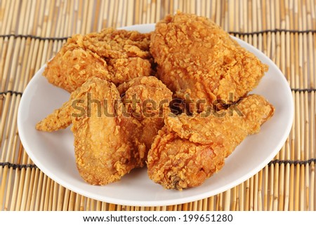 Close up Fresh fried chicken on a white plate