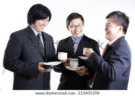 Three Asian business man with coffee break having conversation isolated on white background