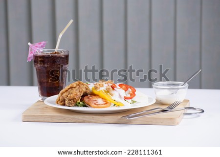 Fried Chicken salad with Cola soft drink