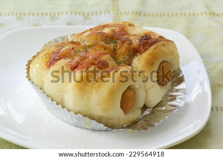 sausage cheese bread roll on the plate