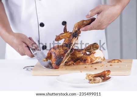 Chef cut Grilled turkey on the plate for Christmas and Thanksgiving day