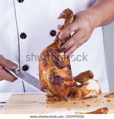 Chef cut Grilled turkey on the plate for Christmas and Thanksgiving day