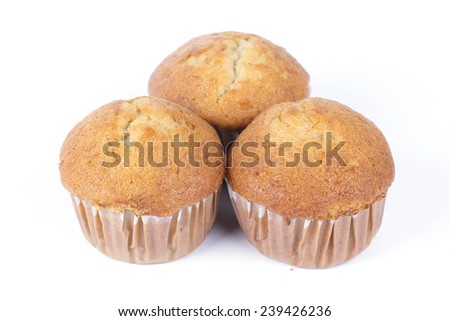 Banana cake in paper cup on white