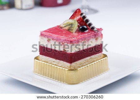 Strawberry Mousse Cake on the white Plate