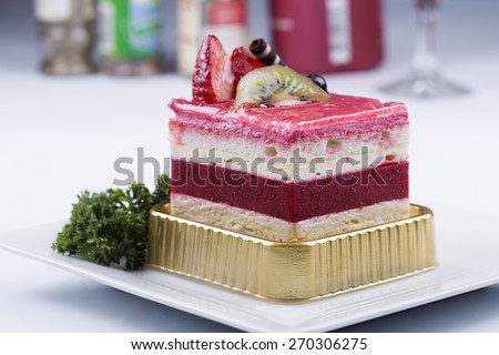 Strawberry Mousse Cake on the white Plate