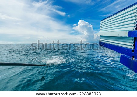 Boat wake foam water propeller wash blue saltwater, Rayong, Thailand