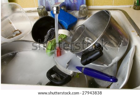 disgusting dirty sink full with dirty dishes