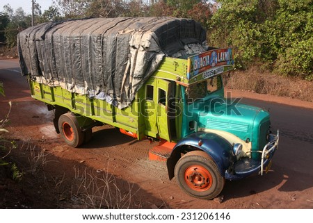 MAHARASHTRA, INDIA - CIRCA 2011: Vintage truck used on Indian dirt road