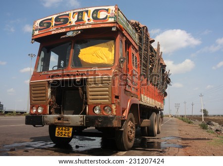 MAHARASHTRA, INDIA - CIRCA 2011: Overloaded Indian truck