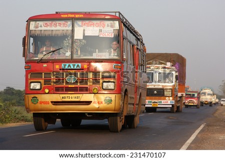 WEST BENGAL CIRCA DECEMBER 2012: Bengali bus marked \'On Election Duty\' carrying police officers on security duties during state elections