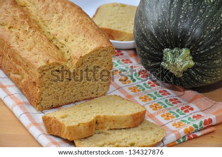 fresh pumpkin bread on a wooden table