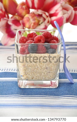 Creamy quinoa milk pudding with fresh berries