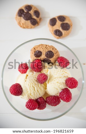 Vanilla Ice Cream with raspberries and chocolate chip cookies