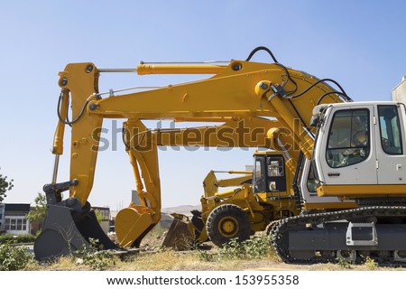 Excavator machines and bulldozer